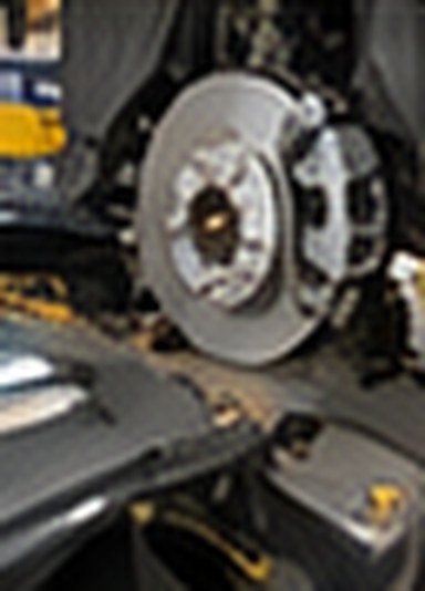New rotor being installed on the Altima's hub