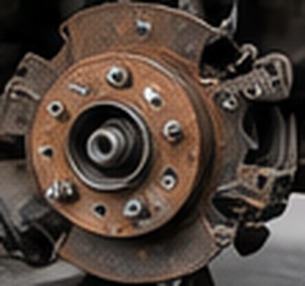 Wheel hub with the old rotor and pads removed