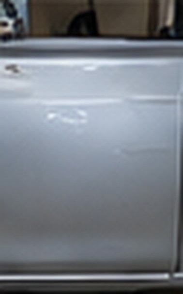 BMW door smoothed and prepared for paint