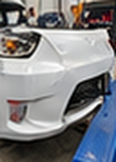 New white bumper fitted and painted on the Camry