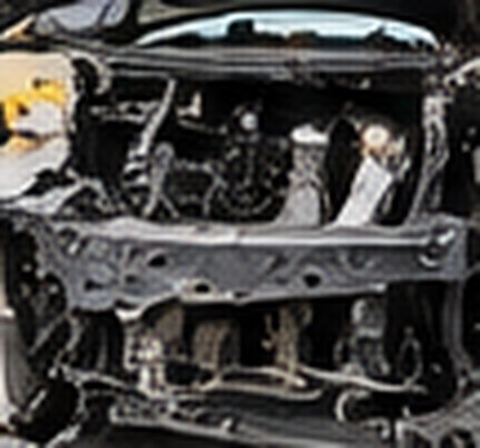 Toyota Camry front end with the bumper and headlights removed